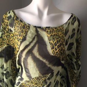 Size Small blouse animal print Sheer